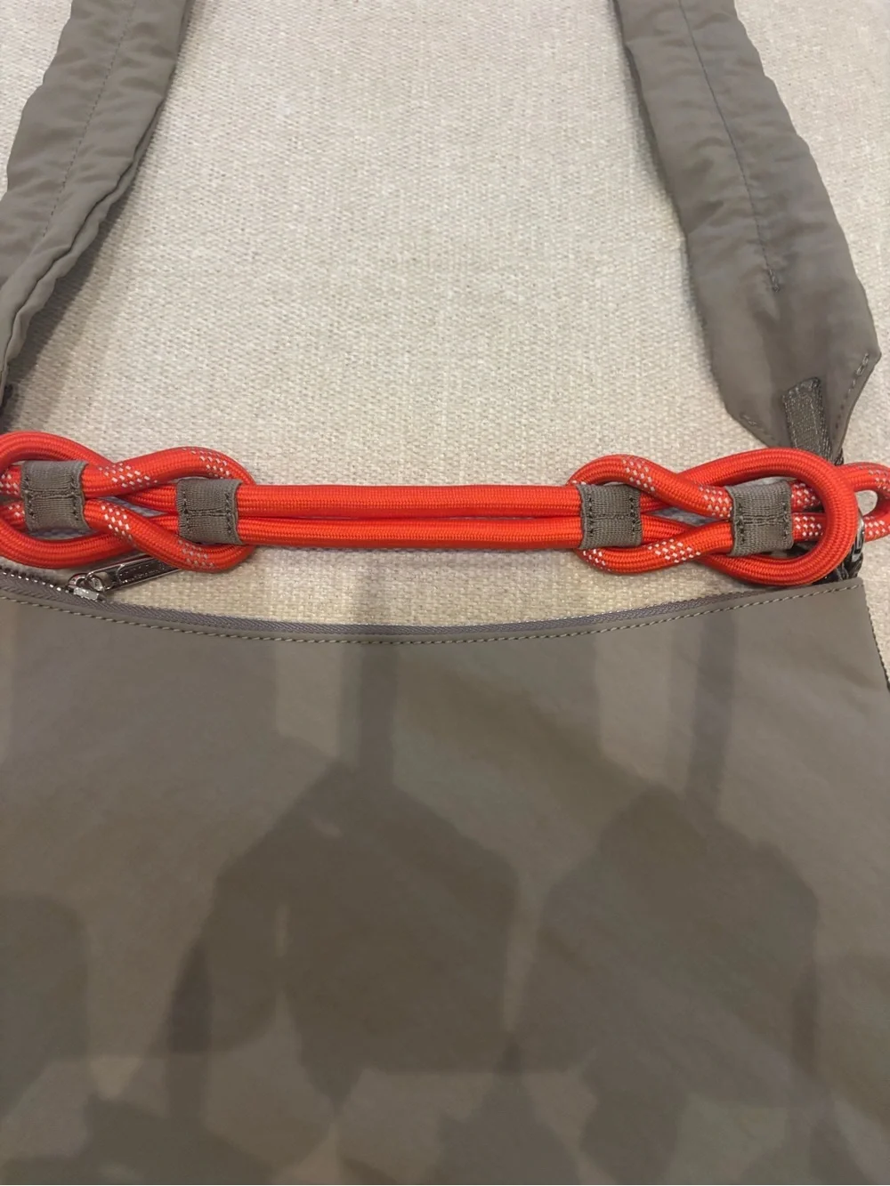 lululemon athletica Tan Crossbody with Orange Chain Accent